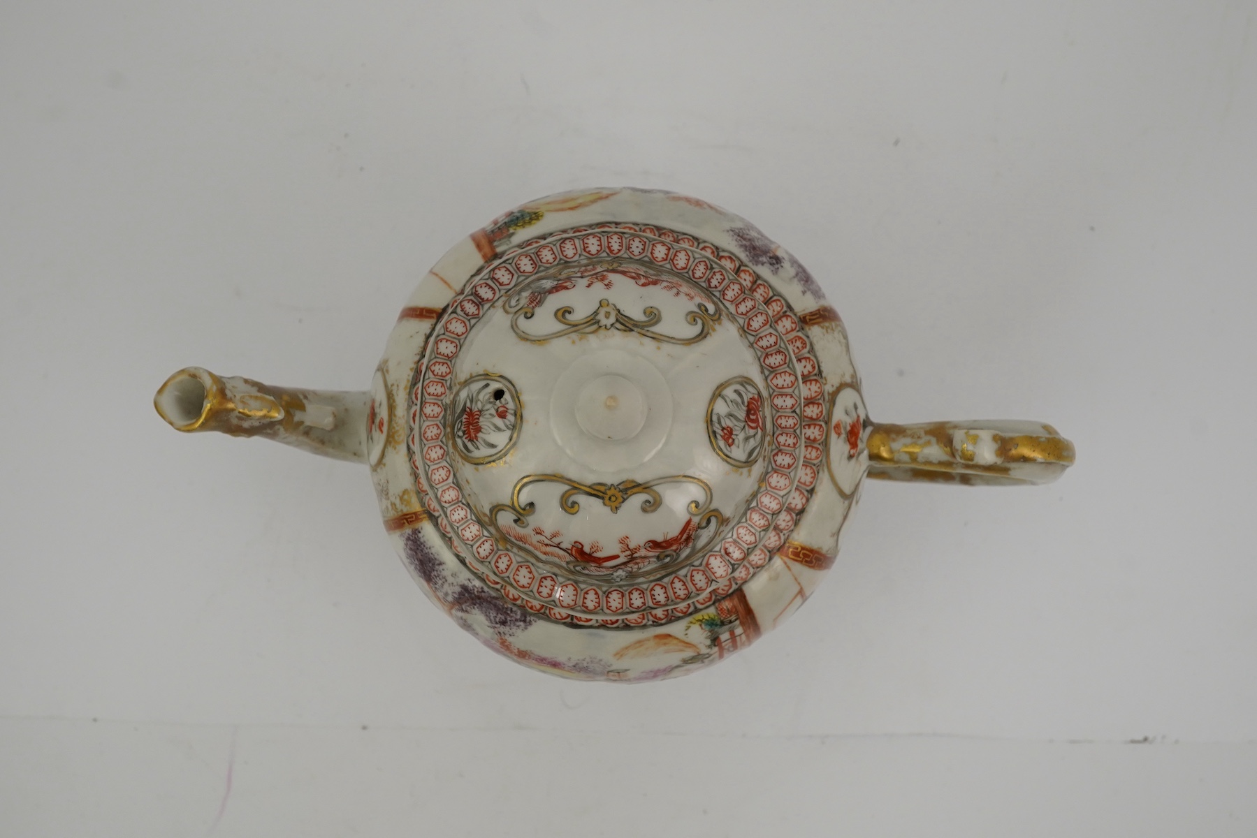 A Chinese famille rose ‘mandarin’ ogee shaped teapot, Qianlong period